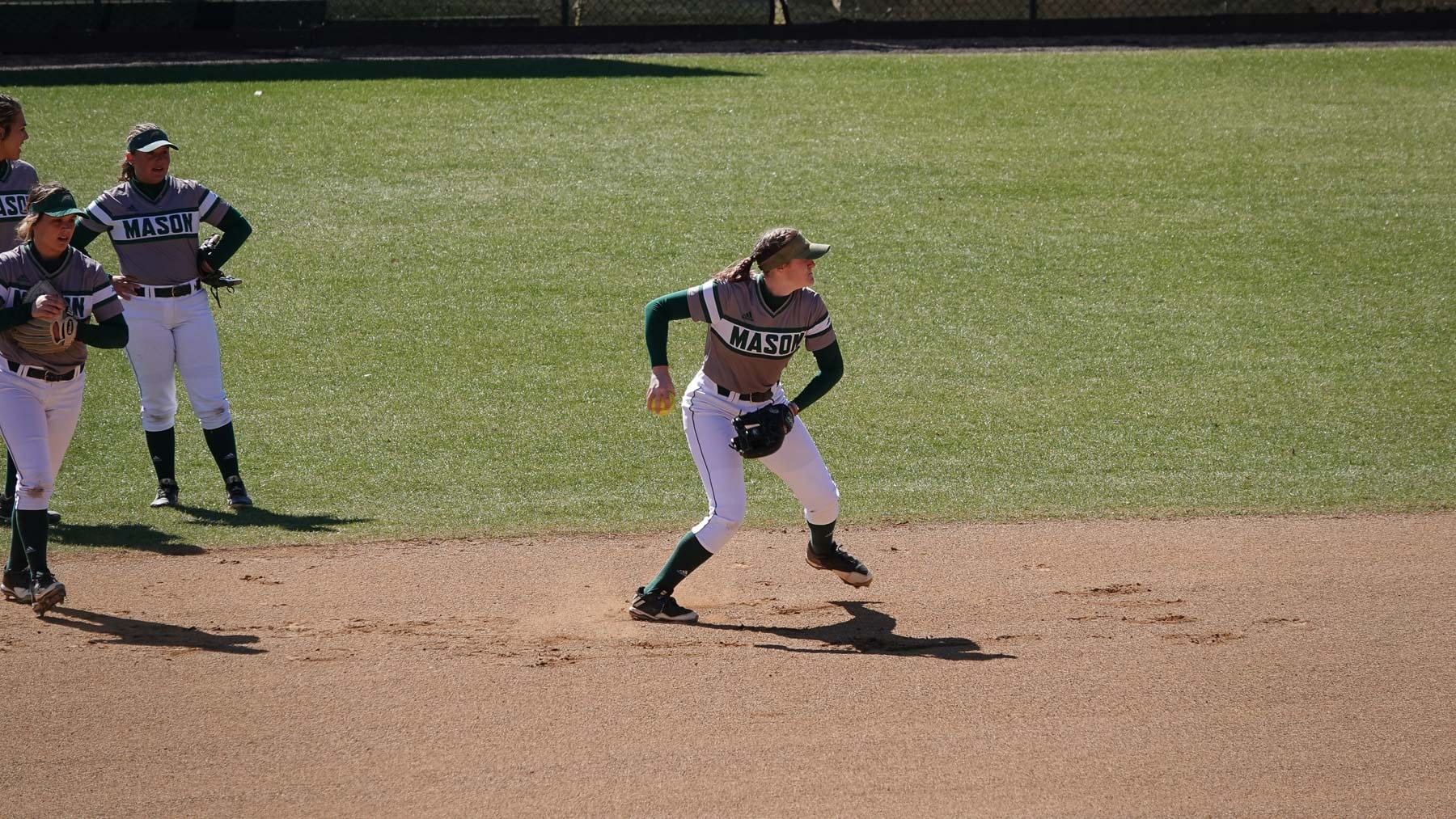 softball throwing from infield