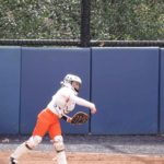 softball catcher position making a throw